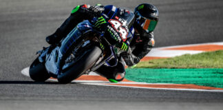 Formula One race car driver Lewis Hamilton (44) on a Monster Energy Yamaha YZR-M1 MotoGP racebike (44) at Valencia. Photo courtesy of Monster Energy Yamaha.