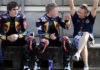 Kevin Schwantz (right) working with Red Bull MotoGP Rookies Cup riders Taylor Mackenzie (center) and Mathew Scholtz (left) at Brno in 2010. Photo by Gold& Goose/GEPA Pictures, courtesy Red Bull.