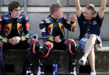 Kevin Schwantz (right) working with Red Bull MotoGP Rookies Cup riders Taylor Mackenzie (center) and Mathew Scholtz (left) at Brno in 2010. Photo by Gold& Goose/GEPA Pictures, courtesy Red Bull.