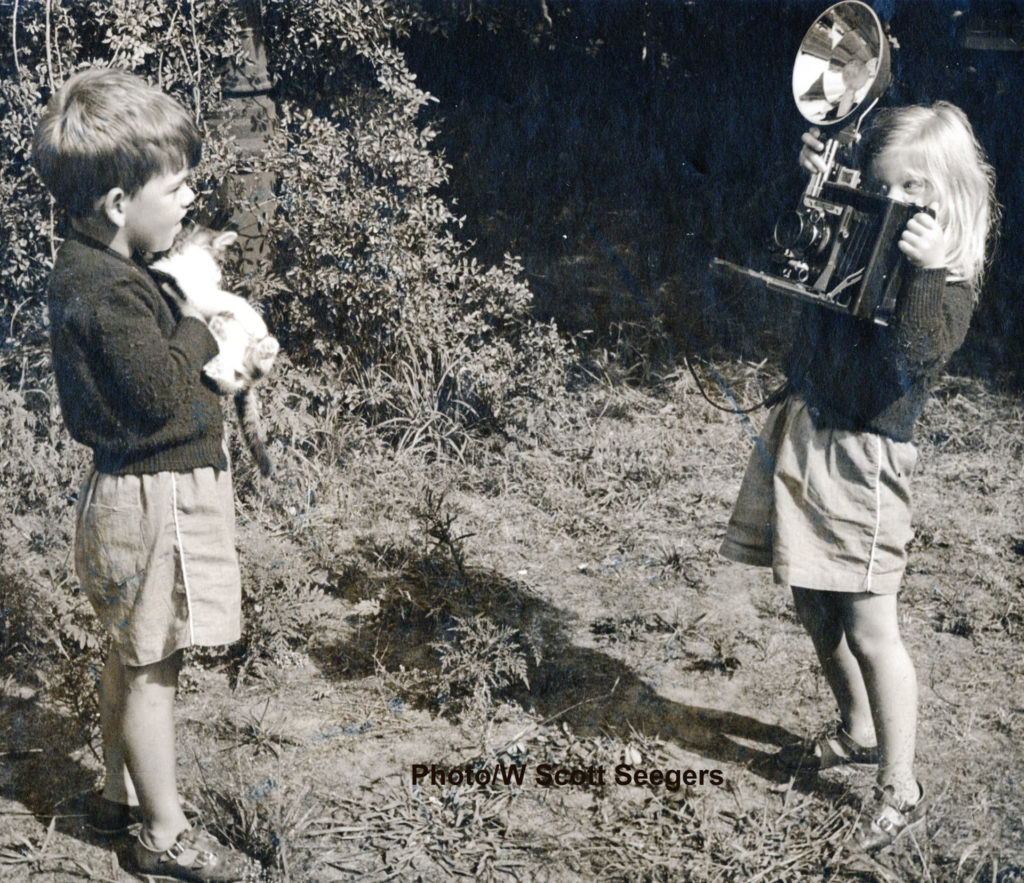 Mary (Seegers) Grothe (right) taking a photo of her brother Scotty Seegers (left) when they were children. Photo by William Scott Seegers, used with permission.