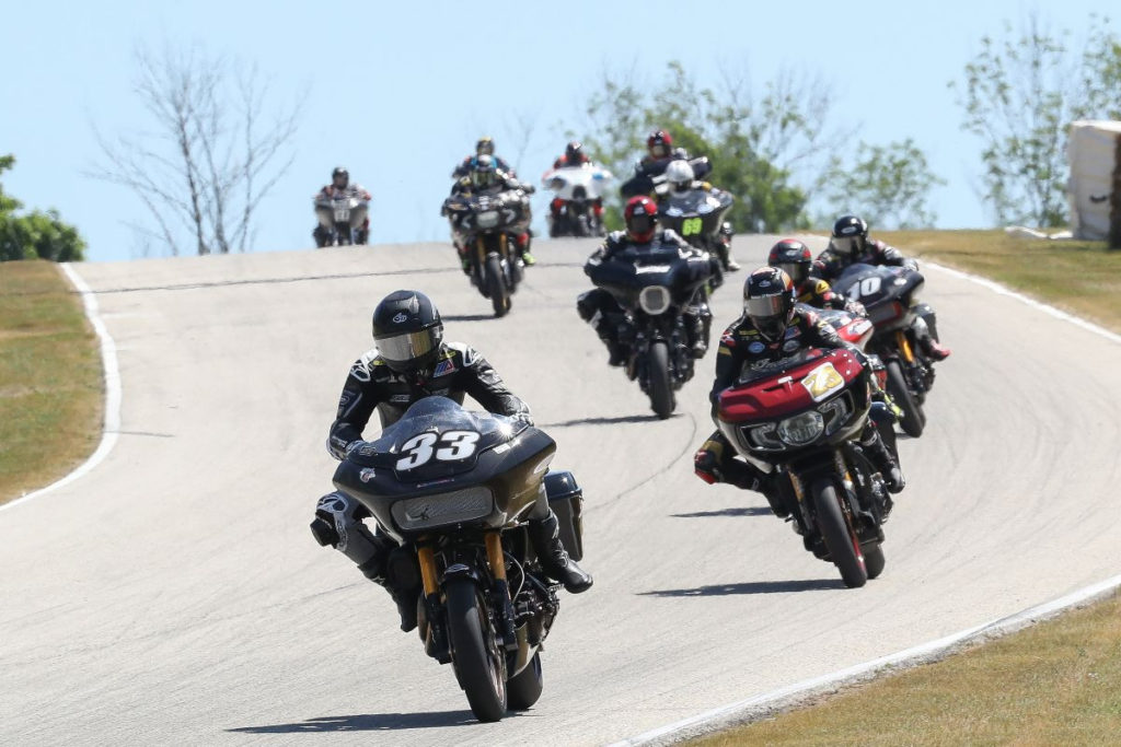 Kyle Wyman (33) leads Tyler O'Hara (29) and the King of the Baggers field at Road America. Photo by Brian J. Nelson.