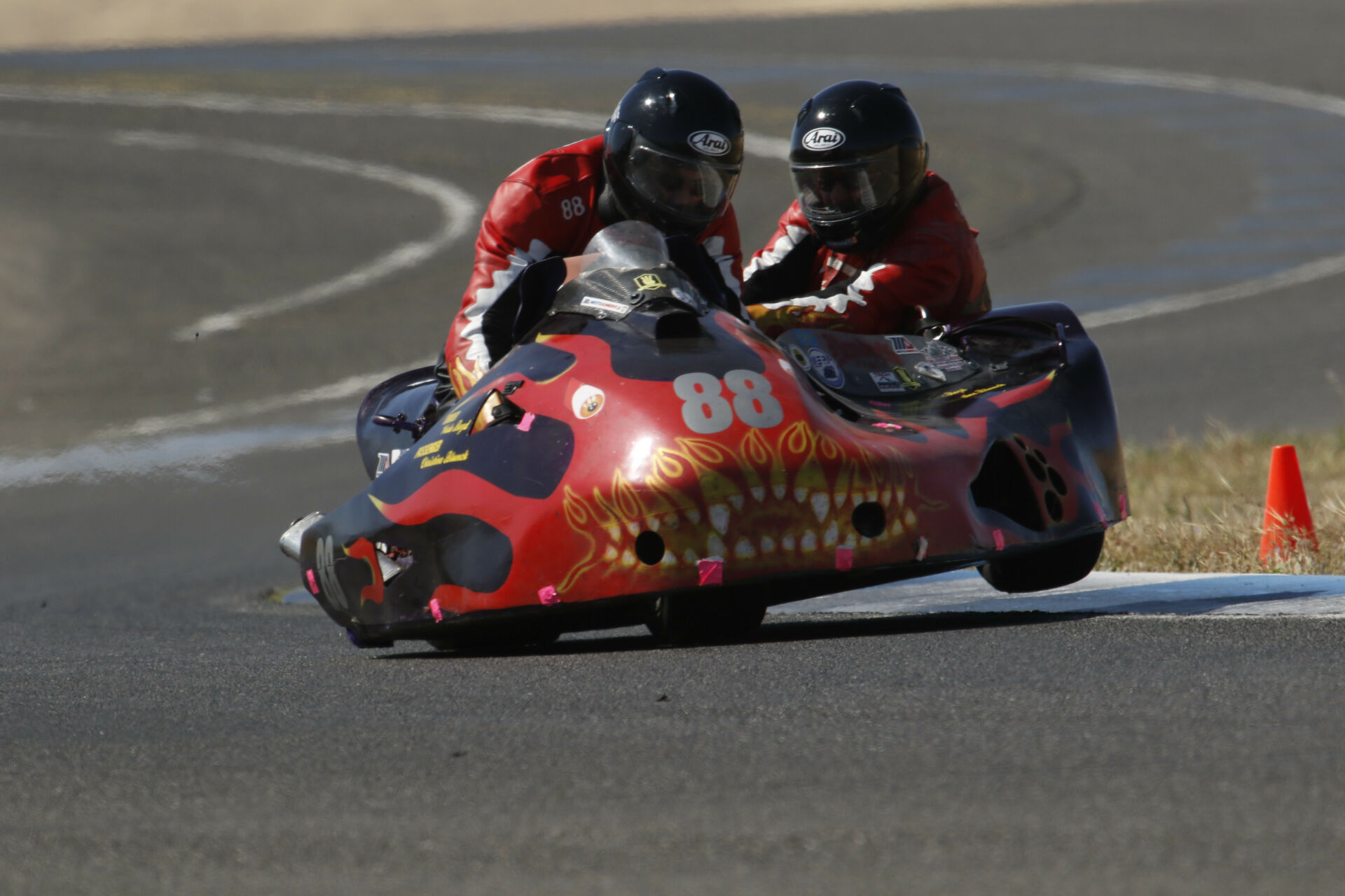 Wade Boyd (88) and passenger Eric Lindauer at speed on their sidecar rig during the AHRMA event at Thunderhill Raceway Park. Photo by Oxymoron Photography, courtesy AHRMA.