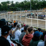 Fans in the stands at an American Flat Track (AFT) event at Black Hills Speedway in 2022. Photo by Tim Lester, courtesy AFT.