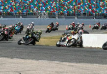 The original start of the 81st Daytona 200 with Josh Herrin (1) leading Danny Eslick (69), PJ Jacobsen (66), Richie Escalante (54), Tyler Scott (70), Geoff May (99), and the rest through Turn One. Photo by Brian J. Nelson.