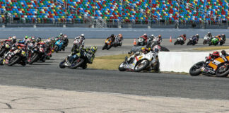 The original start of the 81st Daytona 200 with Josh Herrin (1) leading Danny Eslick (69), PJ Jacobsen (66), Richie Escalante (54), Tyler Scott (70), Geoff May (99), and the rest through Turn One. Photo by Brian J. Nelson.