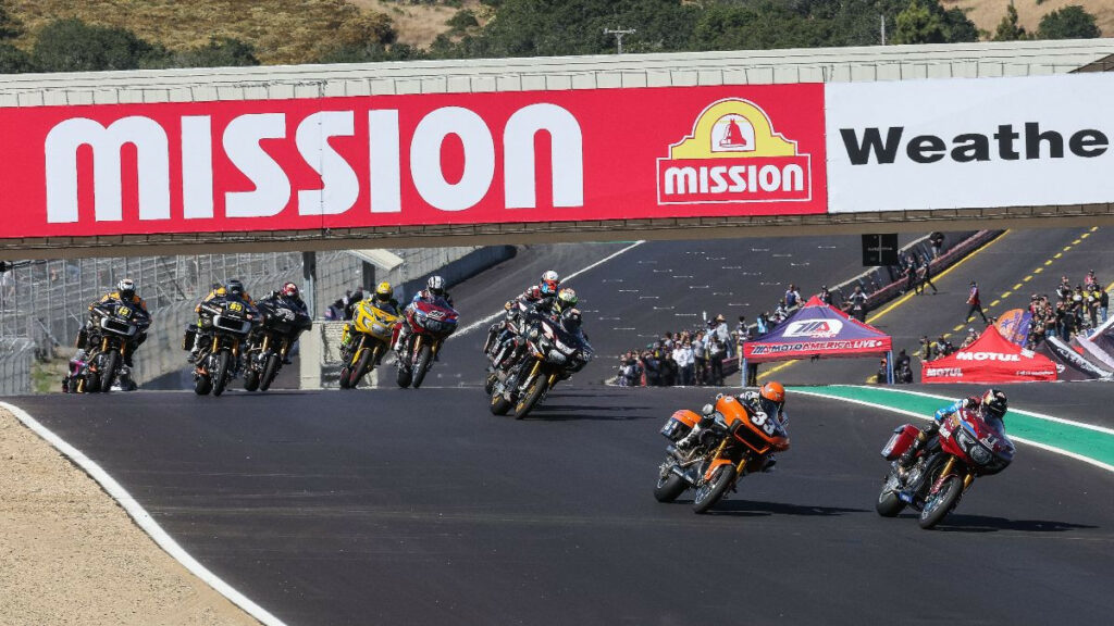 Tyler O'Hara (1) and Kyle Wyman (33) lead the Mission King Of The Baggers field over the hill at the start of Saturday's race at WeatherTech Raceway Laguna Seca. Photo by Brian J. Nelson.
