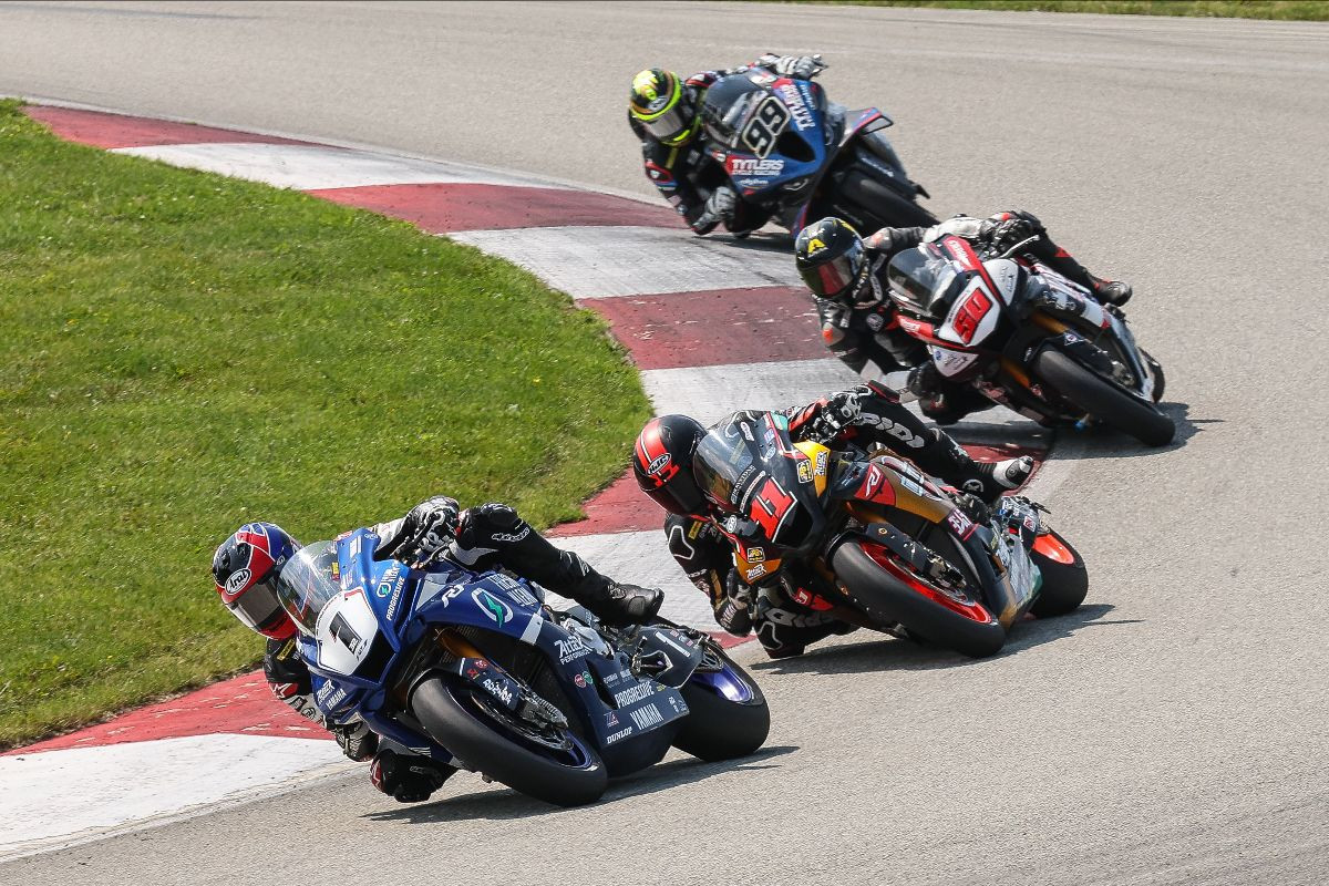 Although he was never headed, Jake Gagne (1) was chased in the early goings by Mathew Scholtz (11), Bobby Fong (50), and PJ Jacobsen (99). Photo by Brian J. Nelson, courtesy MotoAmerica.