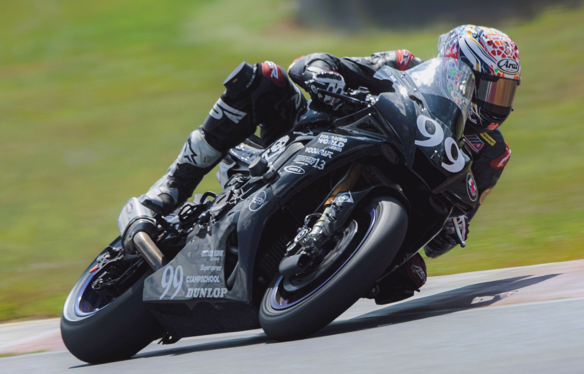 Taylor Knapp (99) takes a weekend off from work testing Dunlop motorcycle tires to come to Summit Point to ride a motorcycle equipped with Dunlop tires..but recreationally. Photo by Vae Vang/Noiseless Productions, courtesy Army of Darkness.