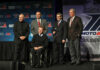 KRAVE Group/MotoAmerica partners Terry Karges (far left), Chuck Aksland (second from left), Wayne Rainey (center), and Richard Varner (far right) with AMA President Rob Dingman (second from right) at the 2018 MotoAmerica awards banquet at Barber Motorsports Park. Photo by Brian J. Nelson.