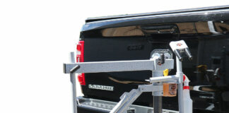 A No-Mar Tire Changer mounted on a tow hitch receiver. Photo courtesy No-Mar Tire Changer.