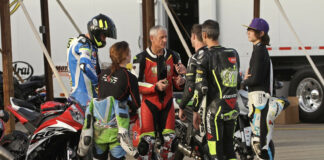 Ken Hill (in red leathers) with students and fellow riding instructors. Photo by Joe Salas, 4theRiders.com, courtesy 2Fast Motorcycle Trackdays.