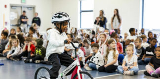 The kindergarten class at Leeds Primary School, in Leeds, Alabama, got an All Kids Bike learn-to-ride Physical Education program courtesy of a donation from BMW Motorrad USA and the Barber Vintage Festival. Photo by Parker S. Freedman, courtesy BMW Motorrad USA.