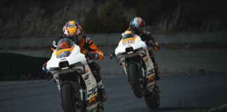 Jack Miller (43) and Brad Binder (33) at speed on KTM RC 8C track bikes. Photo E. Tschann, courtesy KTM.