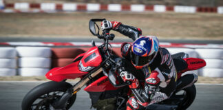 Josh Herrin wearing his custom painted KYT KX-1 Race helmet while testing a Ducati 698 Hypermotard. Photo courtesy Ducati and KYT Americas.
