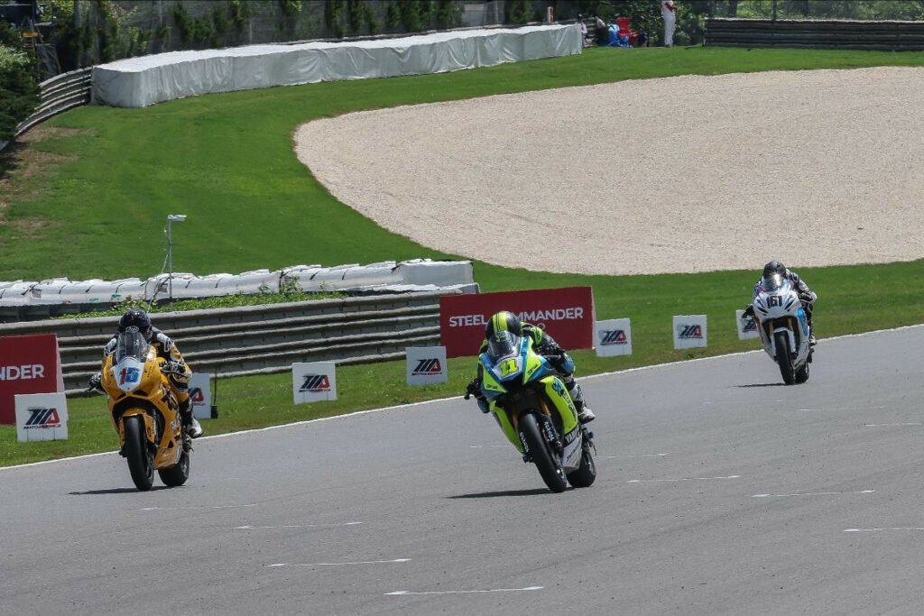 Mathew Scholtz (11) beat PJ Jacobsen (15) to the finish line to win his first MotoAmerica Supersport race. Photo by Brian J. Nelson.