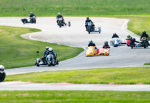 Pilot Daniel May and passenger Craig Chawla (93) lead a combined sidecar race at the AHRMA event at Nelson Ledges. Photo by Cathy Drexler, courtesy AHRMA.