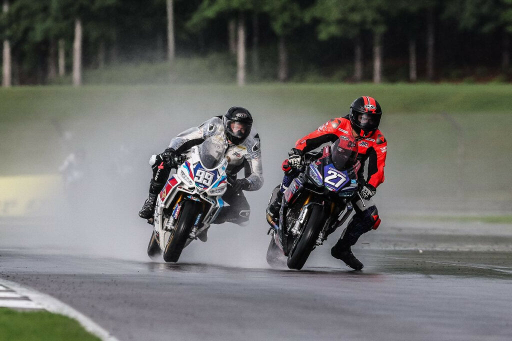 The BellissiMoto Twins Cup race was held in the rain on Saturday afternoon at Barber. Alessandro Di Mario (27) led until crashing out and Avery Dreher (99) was there to score his first Twins Cup victory. Photo by Brian J. Nelson.