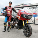 Tyler O'Hara and his personal Indian Challenger RR racebike at New Hampshire Motor Speedway. Photo by Sam Draiss, courtesy Tyler O'Hara Racing.