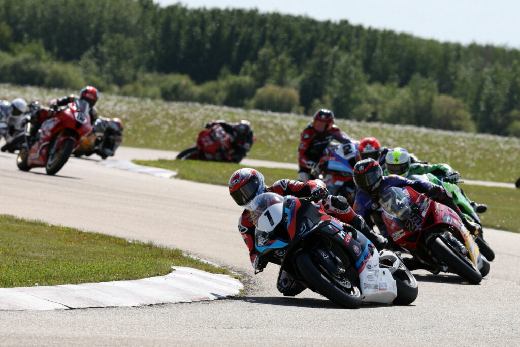 Opening lap Superbike race one action with Ben Young (1) leading the field at RAD Torque Raceway. Defending CSBK champion Young went on to lead every lap on his way to the win. Photo by Rob O'Brien, courtesy CSBK.
