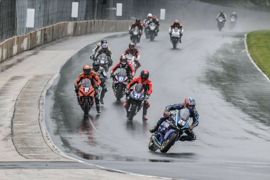 Dominic Doyle (25) dropped the hammer at the start of the BellissiMoto Twins Cup race and never looked back, taking victory over Alessandro Di Mario (27) and Rocco Landers (97).Photo by Brian J. Nelson.