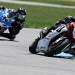 Trevor Daley (166) came back to win Sunday's Pro Sport Bike race at Grand Bend Motorplex after running off-track into the grass early in the 18 lap final. Fellow Suzuki rider Sebastien Tremblay (24) was second ahead of Zoltan Frast in third. Photo by Rob O'Brien, courtesy CSBK.