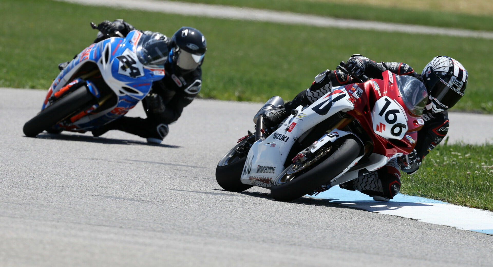 Trevor Daley (166) came back to win Sunday's Pro Sport Bike race at Grand Bend Motorplex after running off-track into the grass early in the 18 lap final. Fellow Suzuki rider Sebastien Tremblay (24) was second ahead of Zoltan Frast in third. Photo by Rob O'Brien, courtesy CSBK.