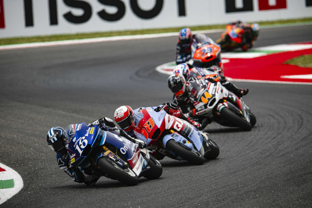 Joe Roberts (16) leads Manuel Gonzalez (18), Aron Canet (44), and the rest early in the Moto2 race at Mugello. Photo courtesy Pirelli.