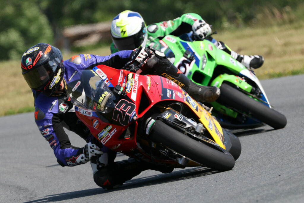 A great mid-race battle between Alex Dumas (23) and Jordan Szoke (101) saw Ducati rider Dumas come out on top to finish second Sunday at AMP. Photo by Rob O'Brien, courtesy CSBK.