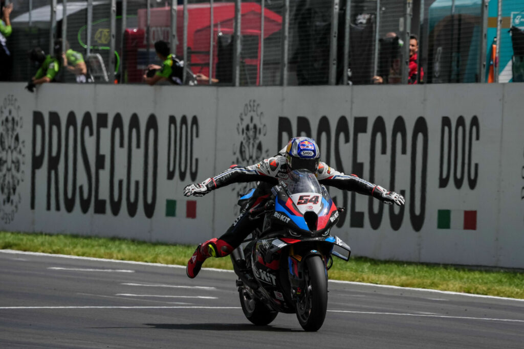 Toprak Razgatlioglu (54) celebrates his Race One win at Donington Park. Photo courtesy Dorna.