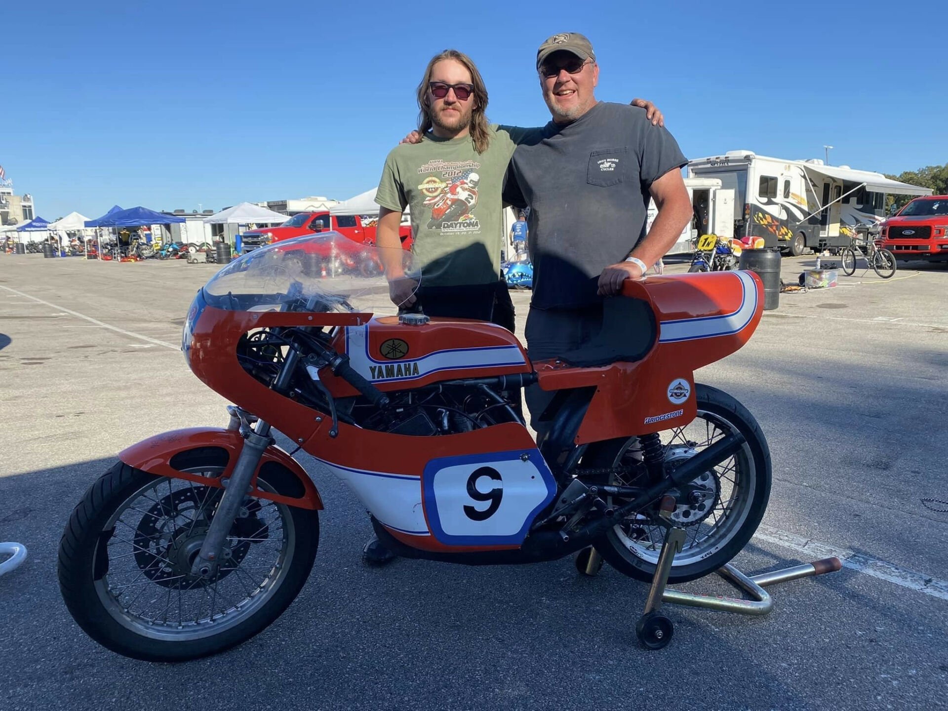 Carl Anderson (right) with Colton Roberts (left) at the Barber Vintage Festival in 2022. Photo by Jacinda Roberts, courtesy AHRMA.