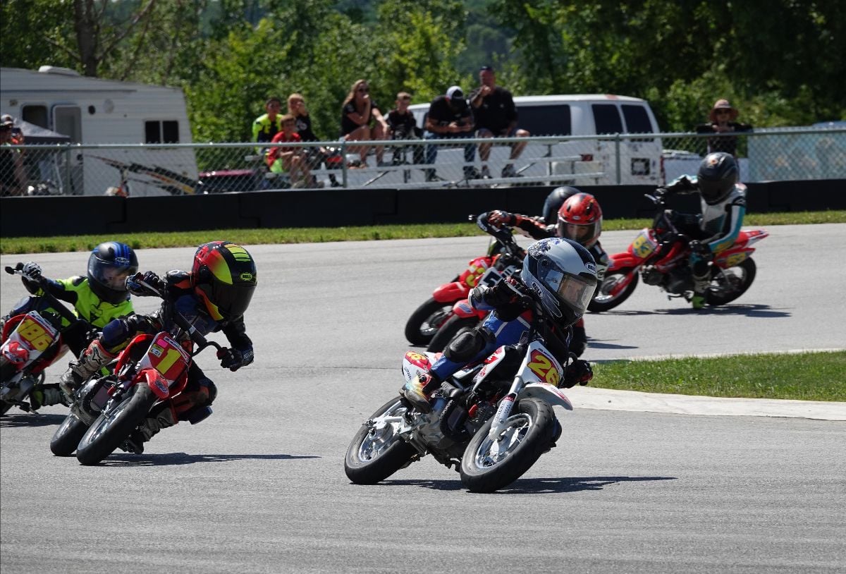 Cruise Texter (26) led portions of both Stock 50 races on Sunday, but it was Chase Jazikoff (1) coming through to take victory in both races. Photo by Larry Lawrence, courtesy MotoAmerica.