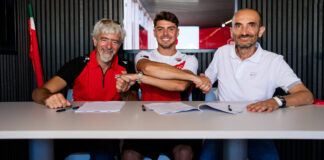 Fabio Di Giannantonio (center) with Ducati CEO Claudio Domenicali (right) and Ducati Corse General Manager Gigi Dall'Igna (left). Photo courtesy Ducati.