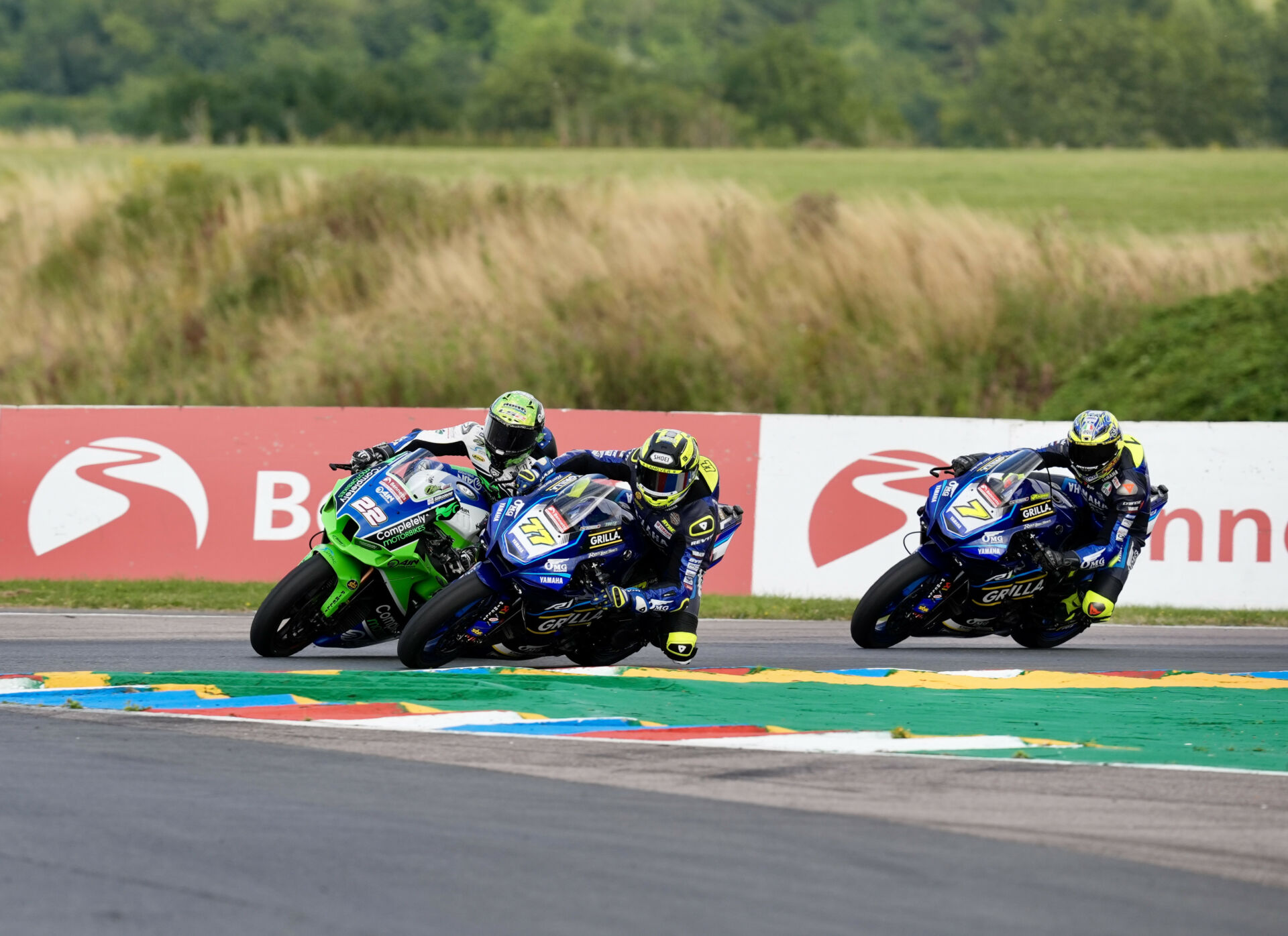 Kyle Ryde (77), Jason O'Halloran (22), and Ryan Vickers (7) fight for the lead at Thruxton. Photo courtesy MSVR.