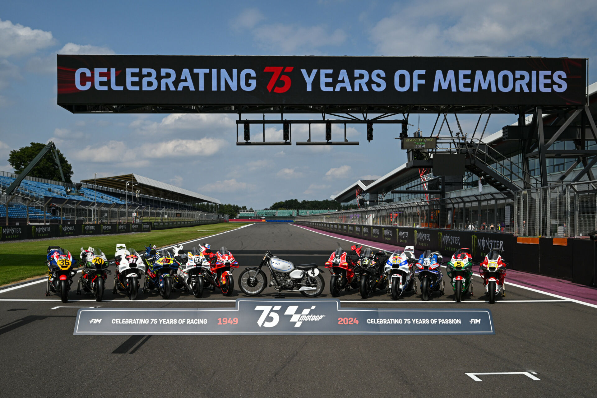 The AJS Porcupine (center) that won the first World Championship, according to Dorna, and the 12 special liveries in play this weekend at Silverstone. Photo courtesy Dorna.