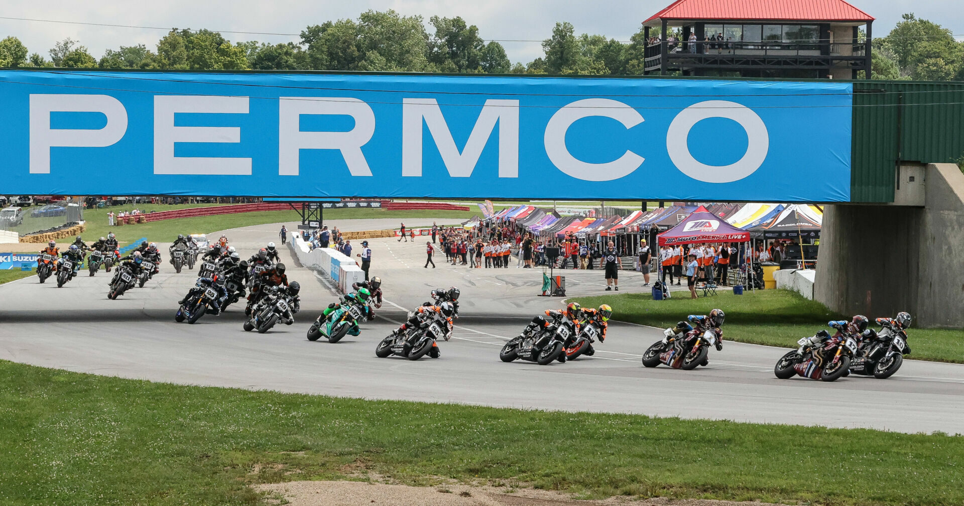 The start of MotoAmerica RSD Mission Super Hooligan Race Two at Mid-Ohio with Travis Wyman (10) and Troy Herfoss (17) contesting the early lead. Photo by Brian J. Nelson.