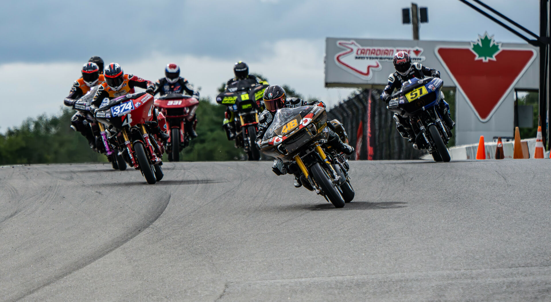 Sam Guerin (418) leads Cody Gilmore (374), Jake Masters (51), and the rest of the field at the start of a BRL race at Canadian Tire Motorsport Park. Photo courtesy Bagger Racing League (BRL).