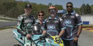 Wolfe Racing Team (from left) Ryan Wolfe, Erika Wolfe, David Wolfe, and crew chief Dakari Harris. Photo by Highside Photo, courtesy Wolfe Racing Team.