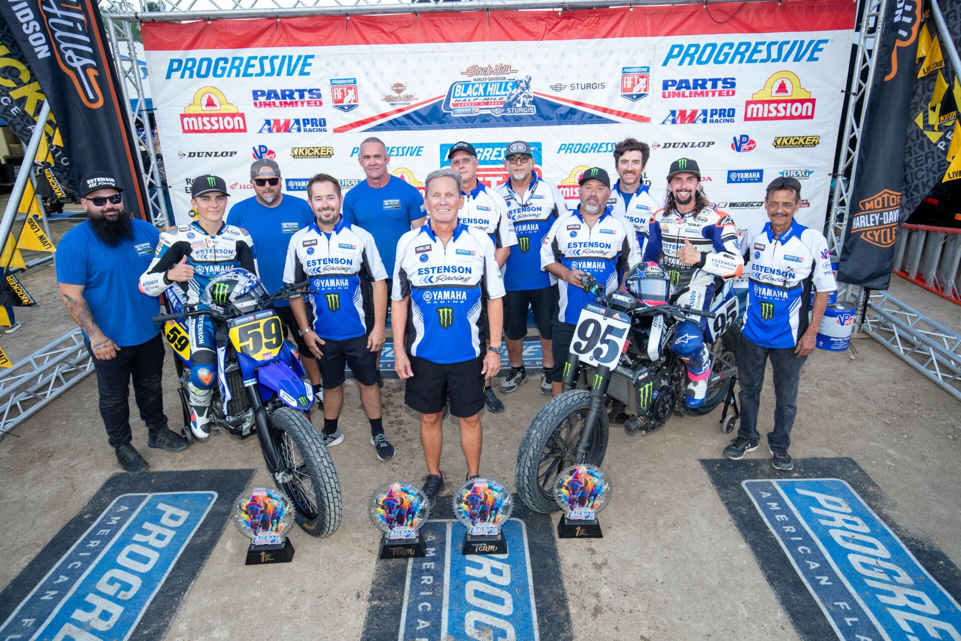 The victorious Estenson Racing team with Tom Drane (59), Team Manager Tommy Hayden (to Drane's left), Team Owner Tim Estenson (to Hayden's left), and JD Beach (95). Photo by Tim Lester, courtesy AFT.