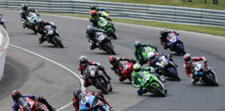 Eventual winner Alex Dumas (23) leads the GP Bikes Pro Superbike field through turn one at the start of Saturday's race one at Canadian Tire Motorsport Park. Ben Young (1) worked his way from ninth on the grid to finish second ahead of Sam Geurin (2). Photo by Rob O'Brien, courtesy CSBK.