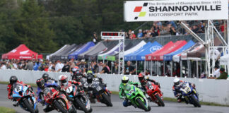 Eventual winner Alex Dumas (23) leads the GP Bikes Pro Superbike field into turn one at Shannonville Motorsport Park during race one action on Saturday. Photo by Rob O'Brien/CSBK.