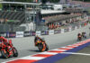 Francesco Bagnaia (1) leading Brad Binder (33) during the MotoGP race in Austria in 2023. Photo courtesy Dorna.