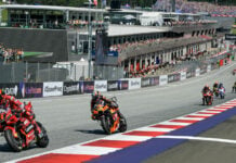 Francesco Bagnaia (1) leading Brad Binder (33) during the MotoGP race in Austria in 2023. Photo courtesy Dorna.