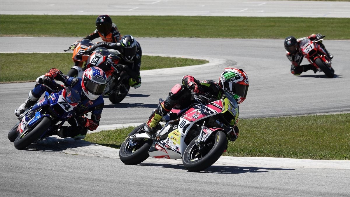 Mahdi Salem (10) and Kensei Matsudaira (74) had the best race of the weekend Sunday with the two swapping the lead until the final lap when Mahdi made a pass in the last set of turns. Photo by Larry Lawrence, courtesy MotoAmerica.