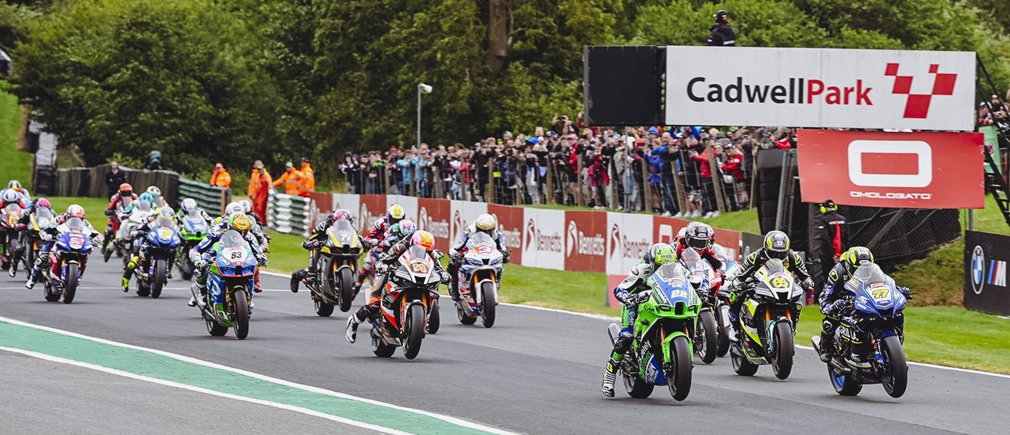 Kyle Ryde (77) and Jason O'Halloran (22) lead the field off the start of Race One Sunday at Cadwell Park. Photo courtesy MSVR.