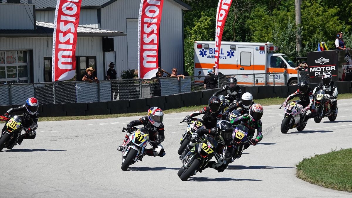 The start of the first GP 160 race on Sunday with race winner Jase Dill (97) taking the early lead. Photo by Larry Lawrence, courtesy MotoAmerica.