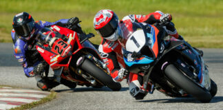 Last lap action as Ben Young (1) leads Alex Dumas (23) through the last corner at Shannonville Motorsport Park to take the win in the final GP Bikes Pro Superbike race of the 2024 CSBK season. Photo by Ron Scheffler, courtesy CSBK.