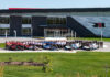 The Rahal Letterman Lanigan Racing teams pose in front of their race shop in Zionsville, Indiana, in 2023. Photo courtesy Rahal Letterman Lanigan Racing.