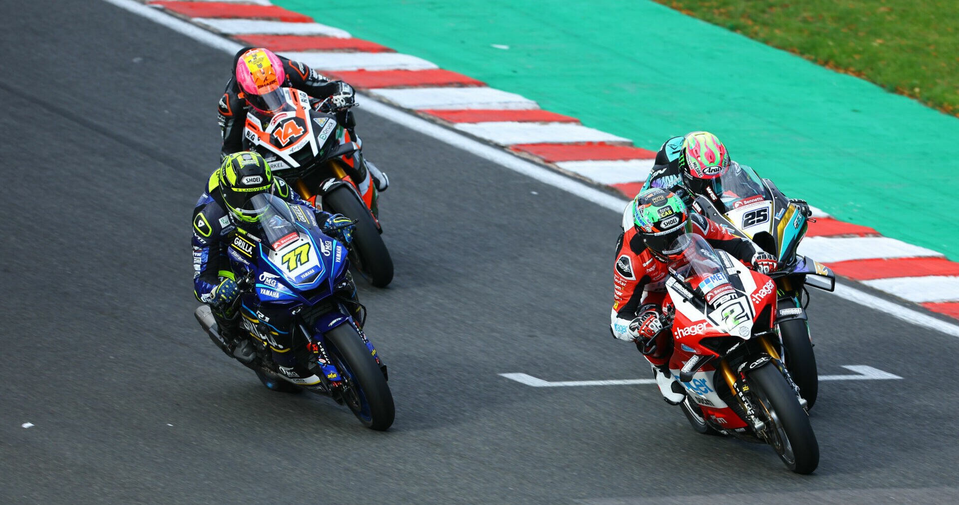 Glenn Irwin (2), Josh Brookes (25), Kyle Ryde (77), and Lee Jackson (14) battle for the lead at Oulton Park. Photo courtesy MSVR.