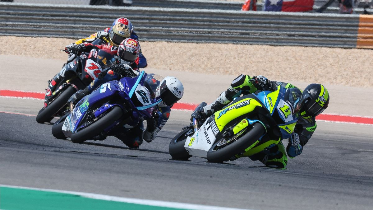 Mathew Scholtz (11) beat Tyler Scott (70) and Blake Davis (22) to win the Supersport race on Sunday at Circuit of The Americas. Photo by Brian J. Nelson.