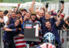 Only Fans American Racing Team's Joe Roberts with John Hopkins (wearing Monster hat) and Team Co-Owner Eitan Butbul (with sunglasses on top of his head), after Roberts won the Moto2 race at Mugello in June. Photo courtesy OnlyFans American Racing Team.